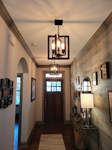 New light fixture installed by ServiceWise electricians in hallway of Canton, GA home.