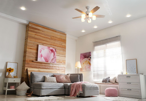 Trending lighting and ceiling fan in Canton, GA home.